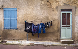 House facade with laundry to dry in Saint Pierre des Champs House facade with laundry to dry in Saint Pierre des Champs